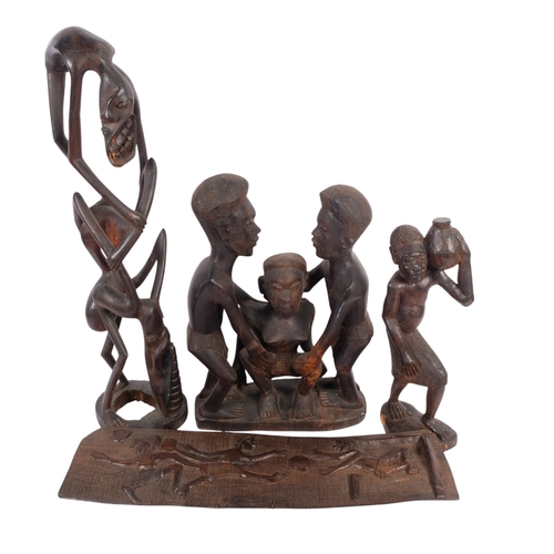 308 - A group of African Tribal carvings, including a Makonde Tribal carved hardwood fertility figure, H41... 