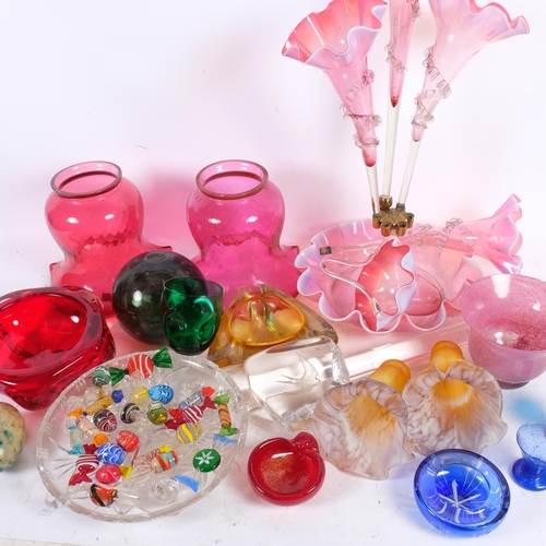 313 - A collection of mixed studio and other glassware, including a cranberry epergne (A/F), various vases... 