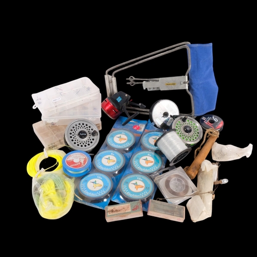 316 - A collection of various freshwater fishing line, reels, flies, etc