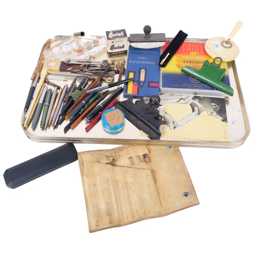 352 - A group of various desk stands, paperclips, fountain and other pens, etc