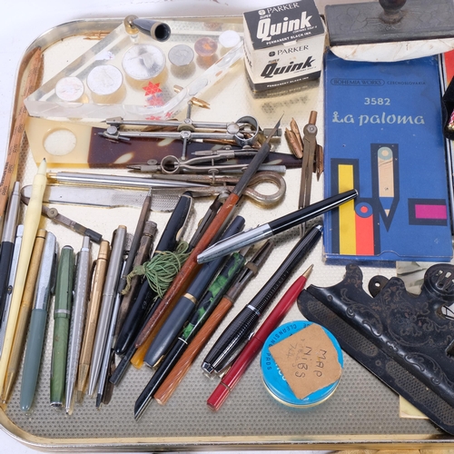 352 - A group of various desk stands, paperclips, fountain and other pens, etc