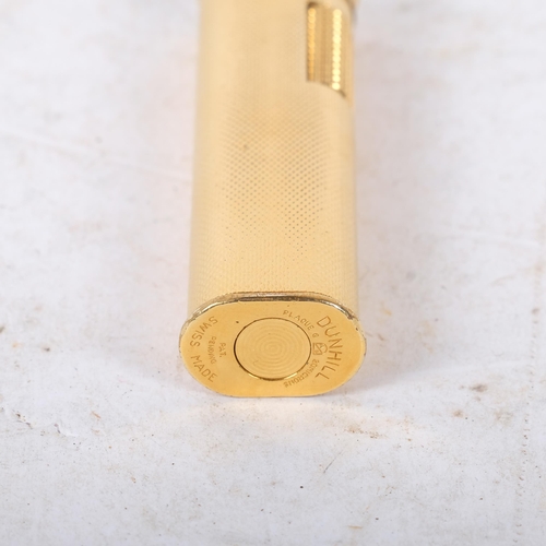 471 - DUNHILL - a Vintage Dunhill dress lighter, engine turned gold plated, 7.3cm