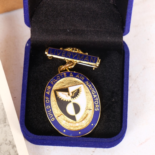473 - A sterling silver Royal Aeronautical Society badge, Vaughton & Sons, Birmingham 1984, a livery badge... 