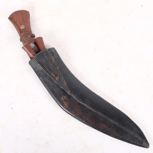 475 - A Vintage Nepalese Khukuri knife, with 2 smaller knives, in fitted leather scabbard