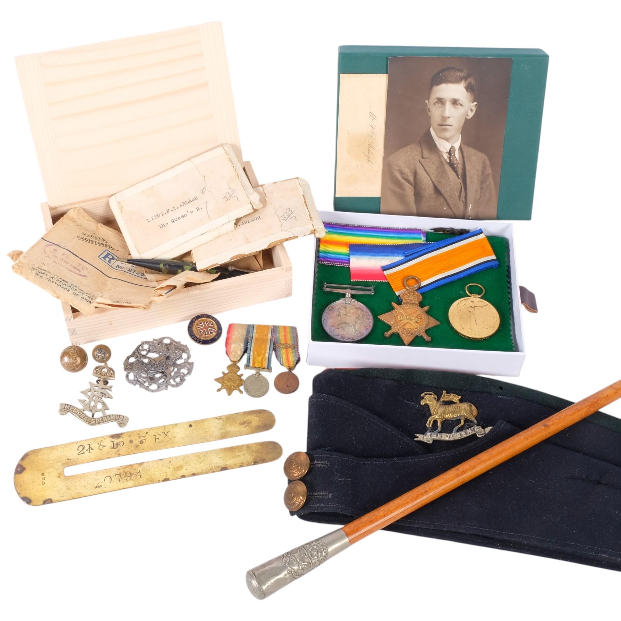 A collection of military items, including a beret for the Queen's Royal ...