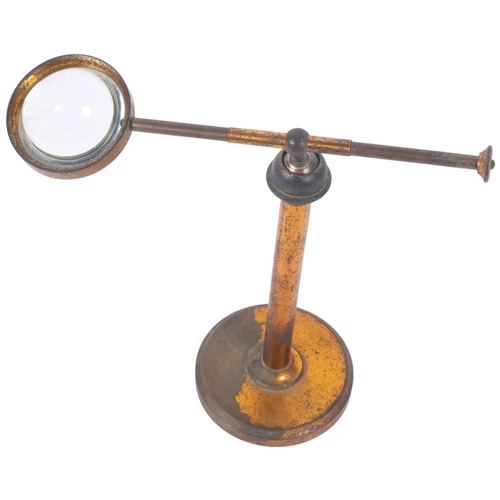 491 - A small Victorian adjustable watch or jewellery maker's magnifying lens on stand