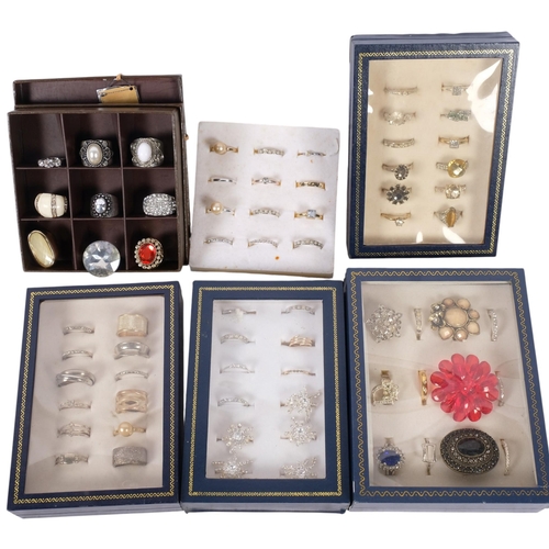 A large collection of fashion dress rings (6 pads and boxes)