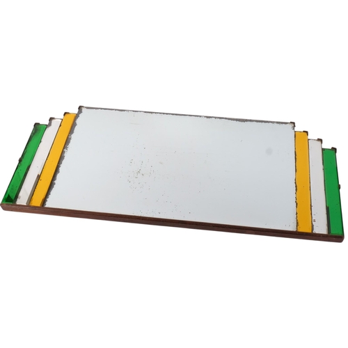 712 - An Art Deco mirror, with multi-coloured geometric panels surrounding rectangular central panel. Widt... 