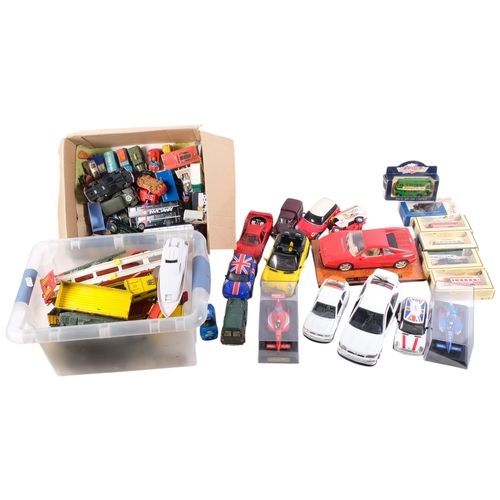 945 - 3 boxes of various diecast and other cars, trucks, Formula 1 cars, Dinky Toys, etc
