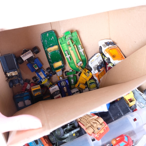 945 - 3 boxes of various diecast and other cars, trucks, Formula 1 cars, Dinky Toys, etc
