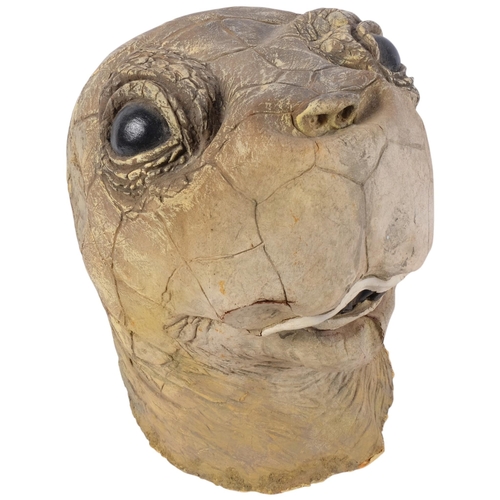 977 - A largescale prop study of a tortoise head, overall length approx 30cm