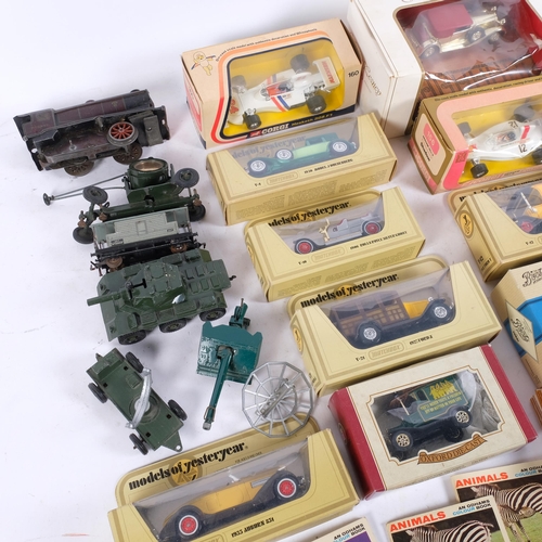 986 - A box containing various toy cars and trains, including examples from Models of Yesteryear, and Corg... 
