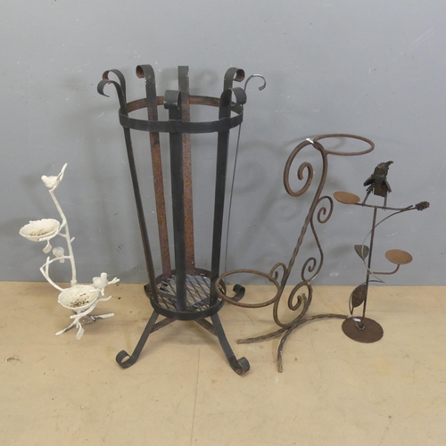 3228 - A wrought iron two tier plant stand. Height 66cm. A cast iron garden waste bin, height 84cm. And 2 b... 