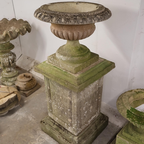 3010 - A large and impressive three section weathered concrete plinth, width 66cm, height 157cm, surmounted... 