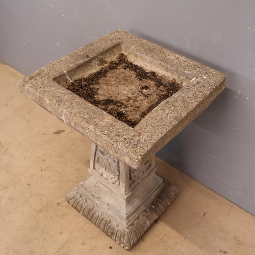 3027 - A vintage bird bath in reconstituted stone and concrete top, with moulded pedestal base featuring ca... 