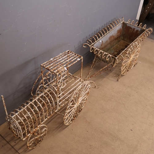 3030 - A wrought iron wirework painted two section planter in the form of a train with galvanised planter t... 