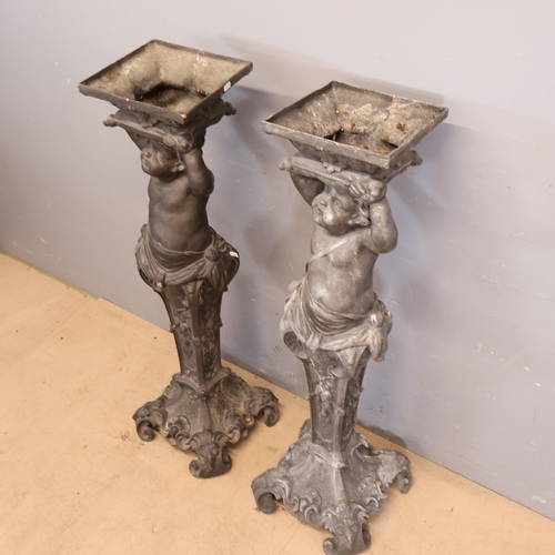 3031 - A pair of two section bronzed resin bird bath/planters with cherub design. Width 34cm, height 109cm,... 