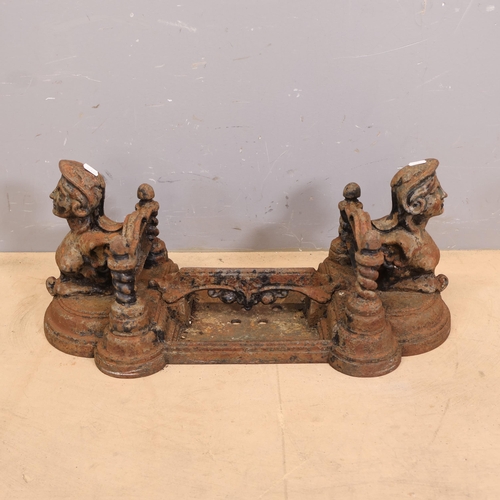3033 - An ornate victorian painted cast iron boot scraper. Width 66cm, height 29cm, depth 30cm.