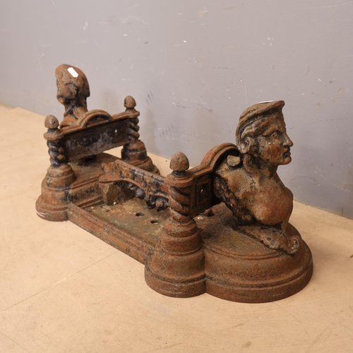 3033 - An ornate victorian painted cast iron boot scraper. Width 66cm, height 29cm, depth 30cm.