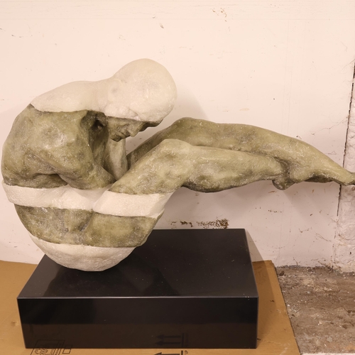 3038 - A contemporary sculpture of a nude man in composite resin with a rectangular pedestal base. Width 93... 