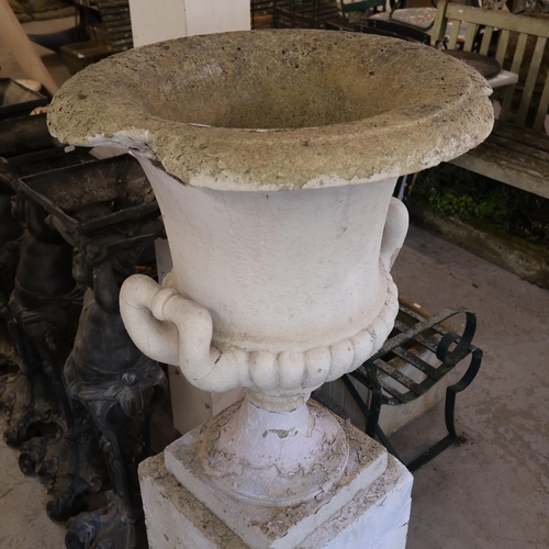 3042 - A large painted three section stone medici urn with weathered finish on square pedestal base. Diamet... 