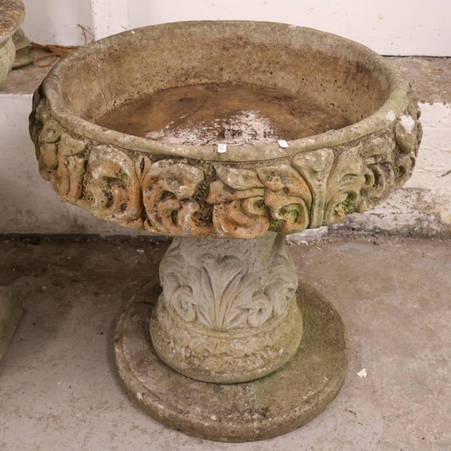 3044 - A large and impressive three section circular reconstituted stone planter with intricate moulded dec... 