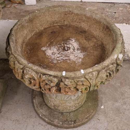 3044 - A large and impressive three section circular reconstituted stone planter with intricate moulded dec... 