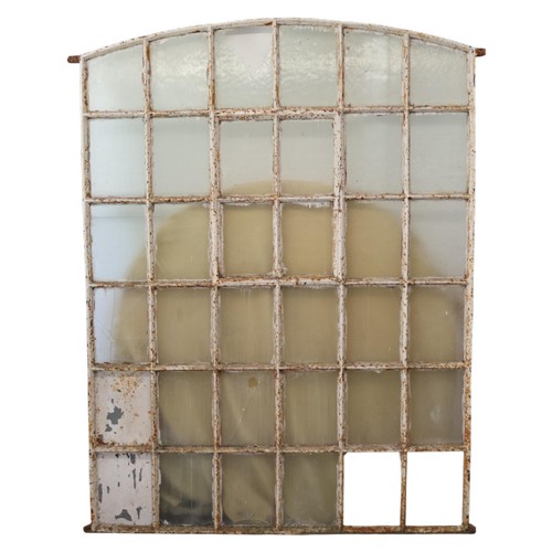 3024 - An antique painted cast iron arch top window, with 36 panes. Width 144cm, height 185cm.