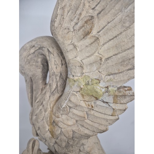 3016 - A large 4-section gothic carved stone garden ornament, in the form of an eagle atop a finial. Width ... 