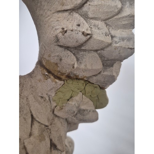 3016 - A large 4-section gothic carved stone garden ornament, in the form of an eagle atop a finial. Width ... 