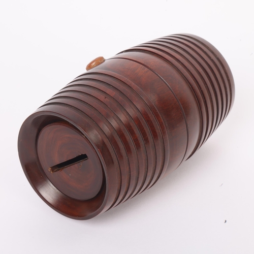 253 - A 19th century lignum vitae barrel design string box, length 12.5cm