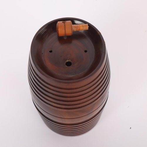 253 - A 19th century lignum vitae barrel design string box, length 12.5cm
