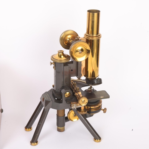 256 - A 19th century brass-mounted student's microscope by J Swift & Son of London, patent no. 24960, orig... 
