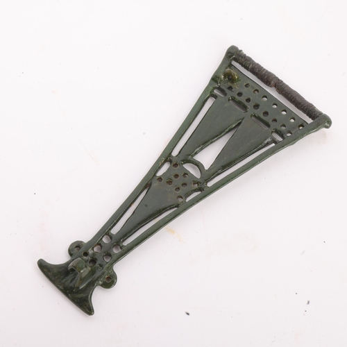 266 - An Iron Age bronze Celtic openwork brooch, with red enamel panels, length 13.5cm
