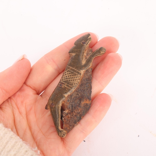267 - A rare Roman bronze folding pocket knife, in the form of a running dog, 1st to 2nd century AD, origi... 