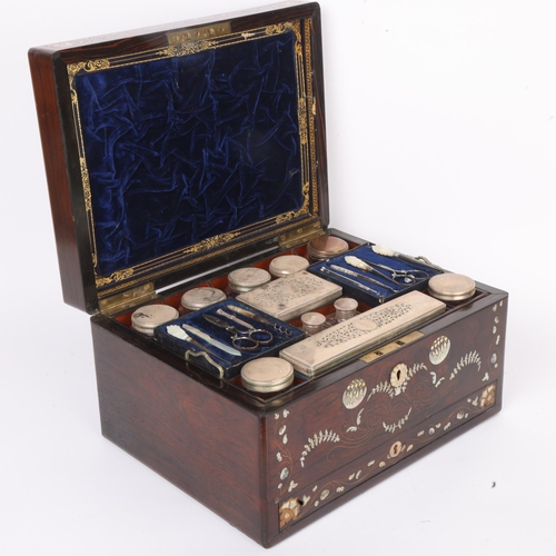 273 - A 19th century rosewood toilet/sewing box, with inlaid brass mother-of-pearl and amboyna marquetry d... 