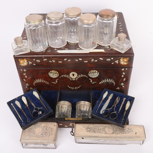 273 - A 19th century rosewood toilet/sewing box, with inlaid brass mother-of-pearl and amboyna marquetry d... 