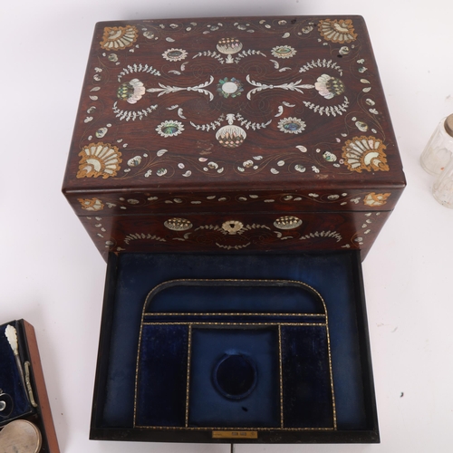 273 - A 19th century rosewood toilet/sewing box, with inlaid brass mother-of-pearl and amboyna marquetry d... 