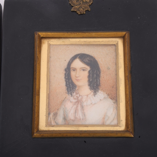 275 - A 19th century miniature portrait of Empress Eugene, watercolour on ivory, unsigned, in original ebo... 