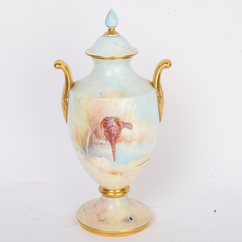 276 - A Caverswall porcelain urn, hand painted Chinese pheasant design by Roger Shufflebottom, height 26cm