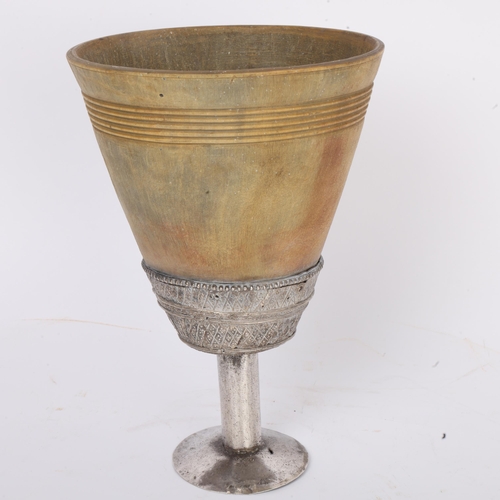 277 - A large Antique Continental rhino horn ceremonial cup, probably late 19th century, on unmarked white... 