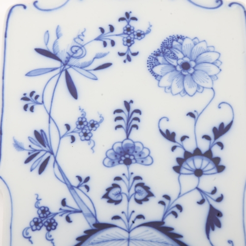282 - A Meissen porcelain blue onion pattern cheese board, length 25cm
