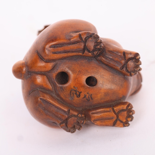 284 - A Japanese carved wood rabbit design netsuke, early to mid-20th century, signed, height 3.5cm