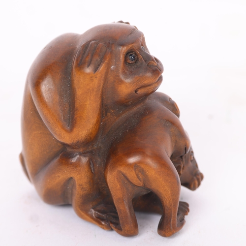 285 - A Japanese carved wood three wise monkey design netsuke, early to mid-20th century, signed, height 4... 