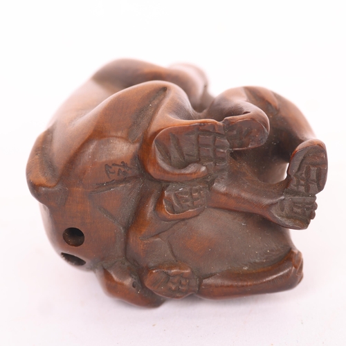 285 - A Japanese carved wood three wise monkey design netsuke, early to mid-20th century, signed, height 4... 