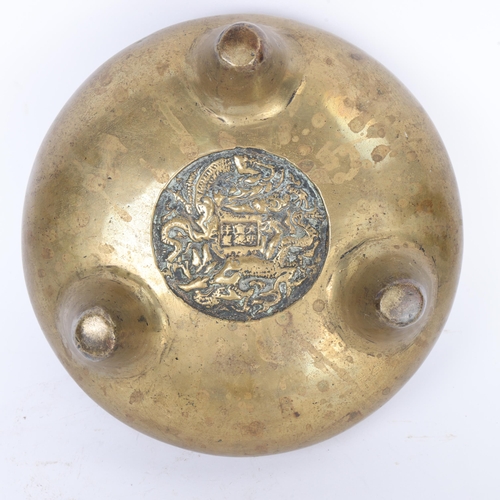 293 - A Chinese bronze 2-handled incense burner, relief cast dragon seal mark under base, diameter 22cm