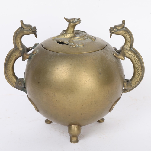 294 - A Chinese bronze incense burner, with dragon handles, height 19cm