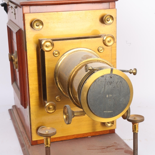 306 - THE DR RICHARD BAINES MAGIC LANTERN COLLECTION - a 19th century mahogany and brass cased magic lante... 