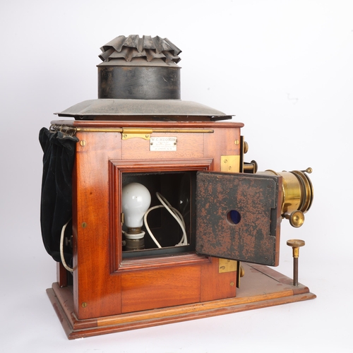 306 - THE DR RICHARD BAINES MAGIC LANTERN COLLECTION - a 19th century mahogany and brass cased magic lante... 