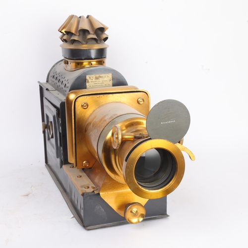 309 - THE DR RICHARD BAINES MAGIC LANTERN COLLECTION - a 19th century metal and brass cased magic lantern,... 